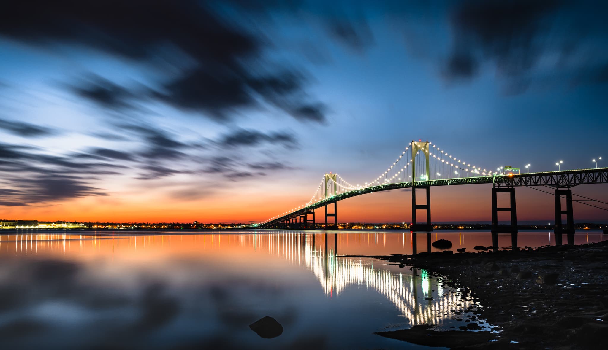 Newport Pell Bridge at sunset seen from Taylor Point in Jamestown, Rhode Island